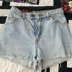 Vintage levis 912 cutoff denim shorts! Very nice wash. 24 inches waist.